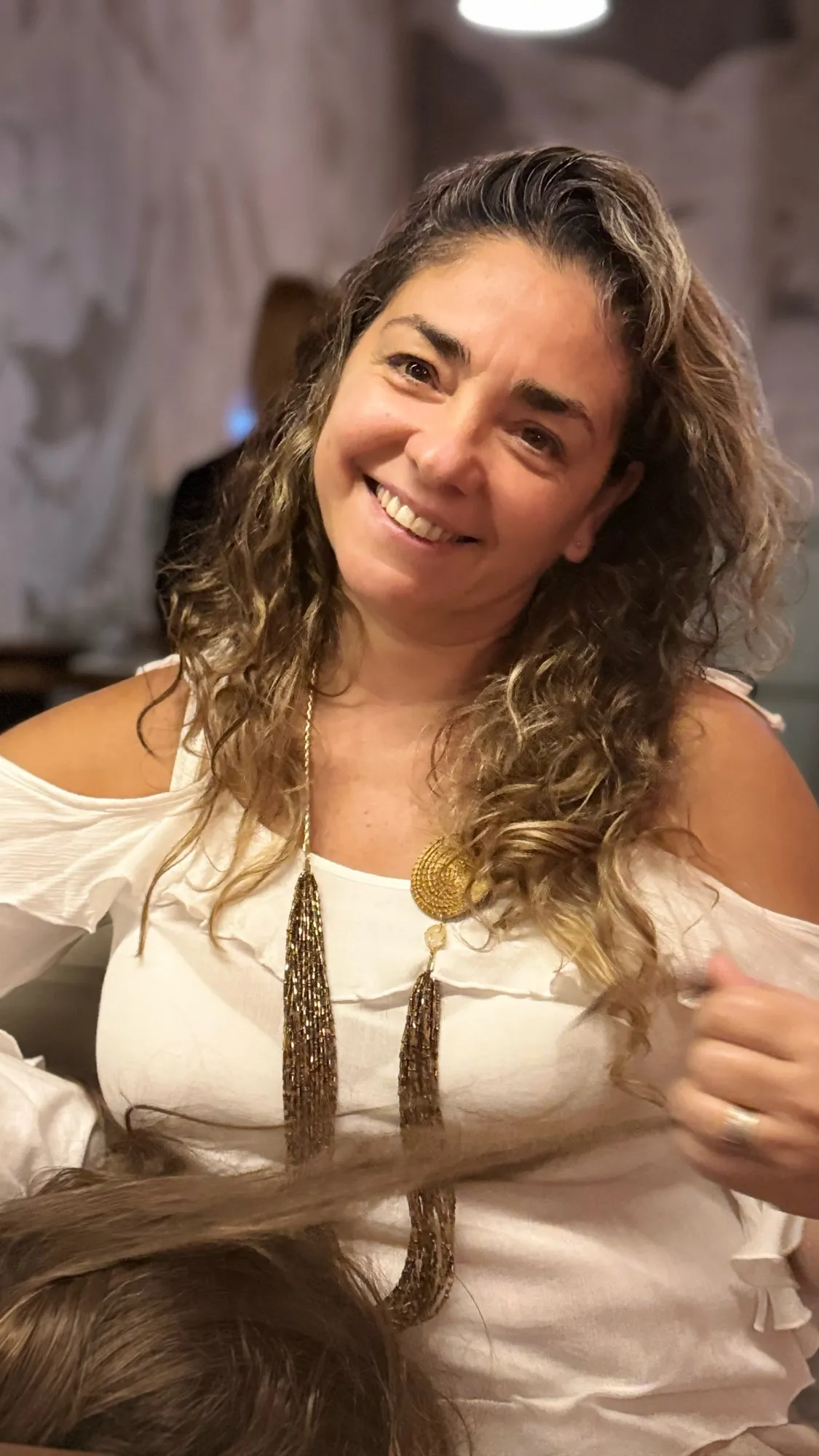 Georgina Ghiorzi sonriendo, en un retrato cálido